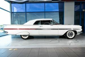 1959 Chevrolet Impala Convertible Snowcrest White with Red Deluxe interior