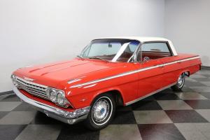 1962 Chevrolet Impala classic American hardtop Roman Red sedan