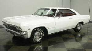 1965 Chevrolet Impala appealing Ermine White over Red 53790 Miles