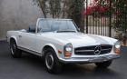 1969 Mercedes Benz 200 Series 280SL Papyrus White with a blue interior